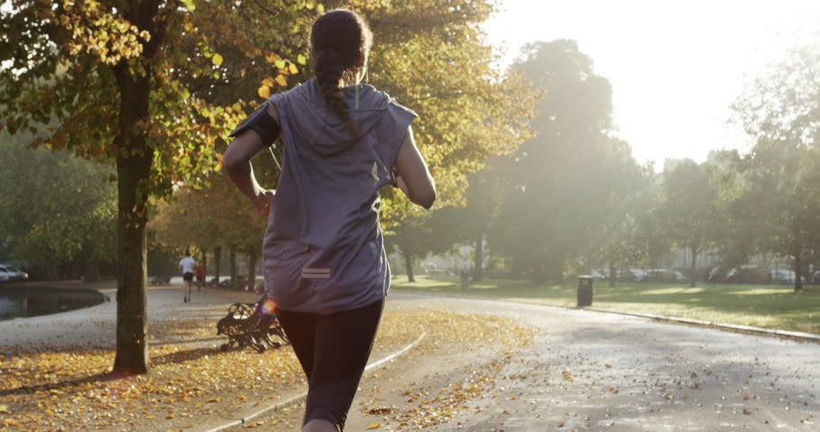 Woman running in park